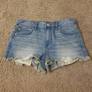 Free people distressed shorts with floral pockets